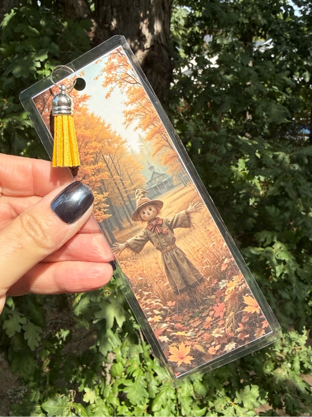 Hand Crafted double-sided laminated bookmark with faux leather tassel
